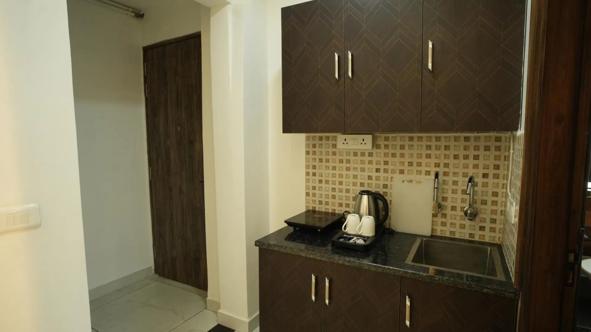 The Empire Corporate Studio Hotel Sector 43 ,Golf Course Road , One Horizon Center Gurgaon